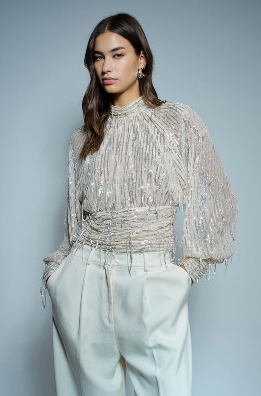 BLUSA CON LENTEJEELAS