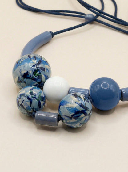 COLLAR BOLAS GRANDES PRINT AZUL CELESTE