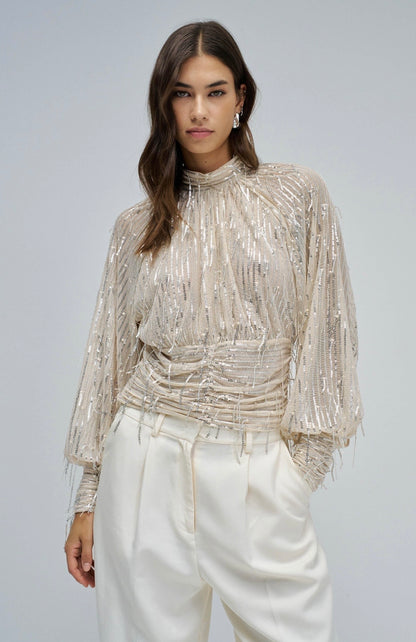 BLUSA CON LENTEJEELAS