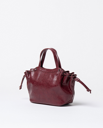 BOLSO EFECTO PIEL CRAQUELADA CON DOS ASAS BURDEOS