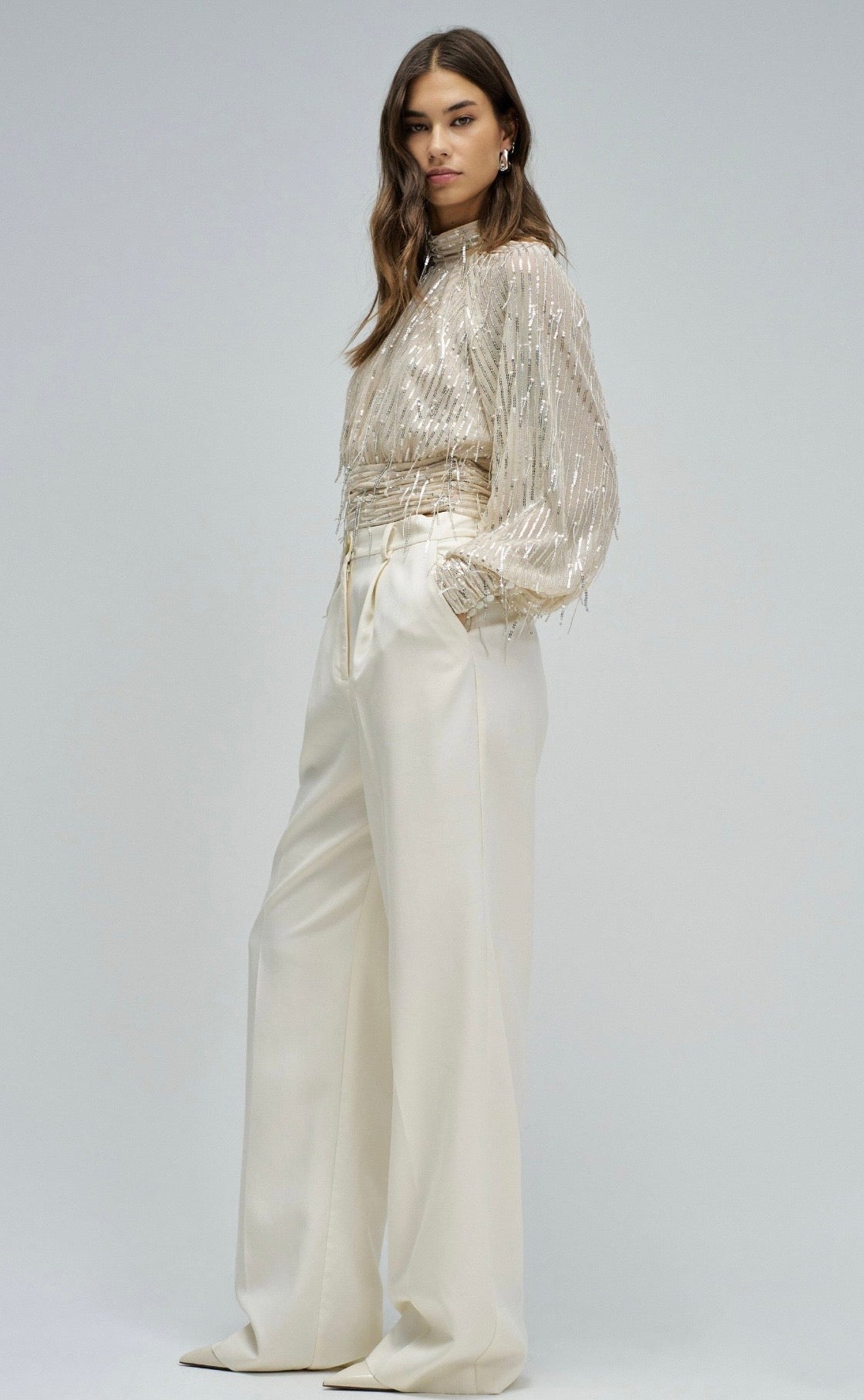 BLUSA CON LENTEJEELAS