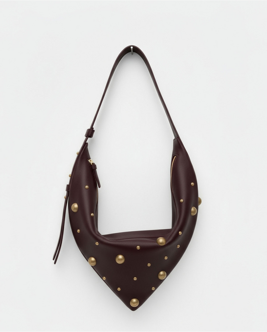BOLSO DE HOMBRO TIPO PAÑUELO CON TACHUELAS GRANATE