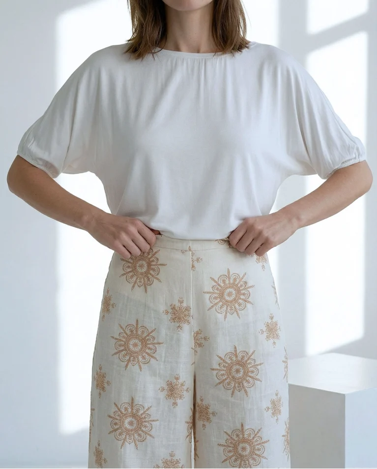 PANTALÓN WIDE LEG FLUIDO TOBILLO CRUDO