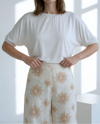 PANTALÓN WIDE LEG FLUIDO TOBILLO CRUDO