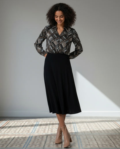 FALDA DE TRICOT COLOR LISO NEGRO