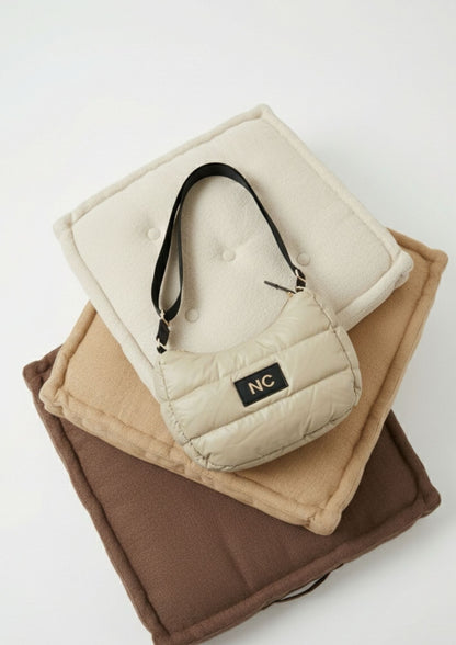 BANDOLERA OVALDA ACOLCHADA PUFFY ULTRALIGERA BEIGE