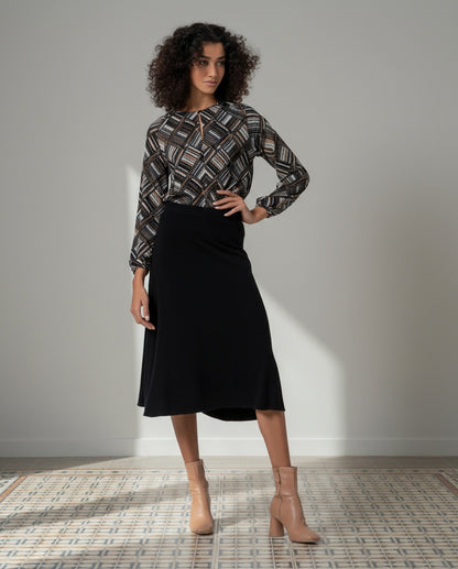 FALDA DE TRICOT COLOR LISO NEGRO