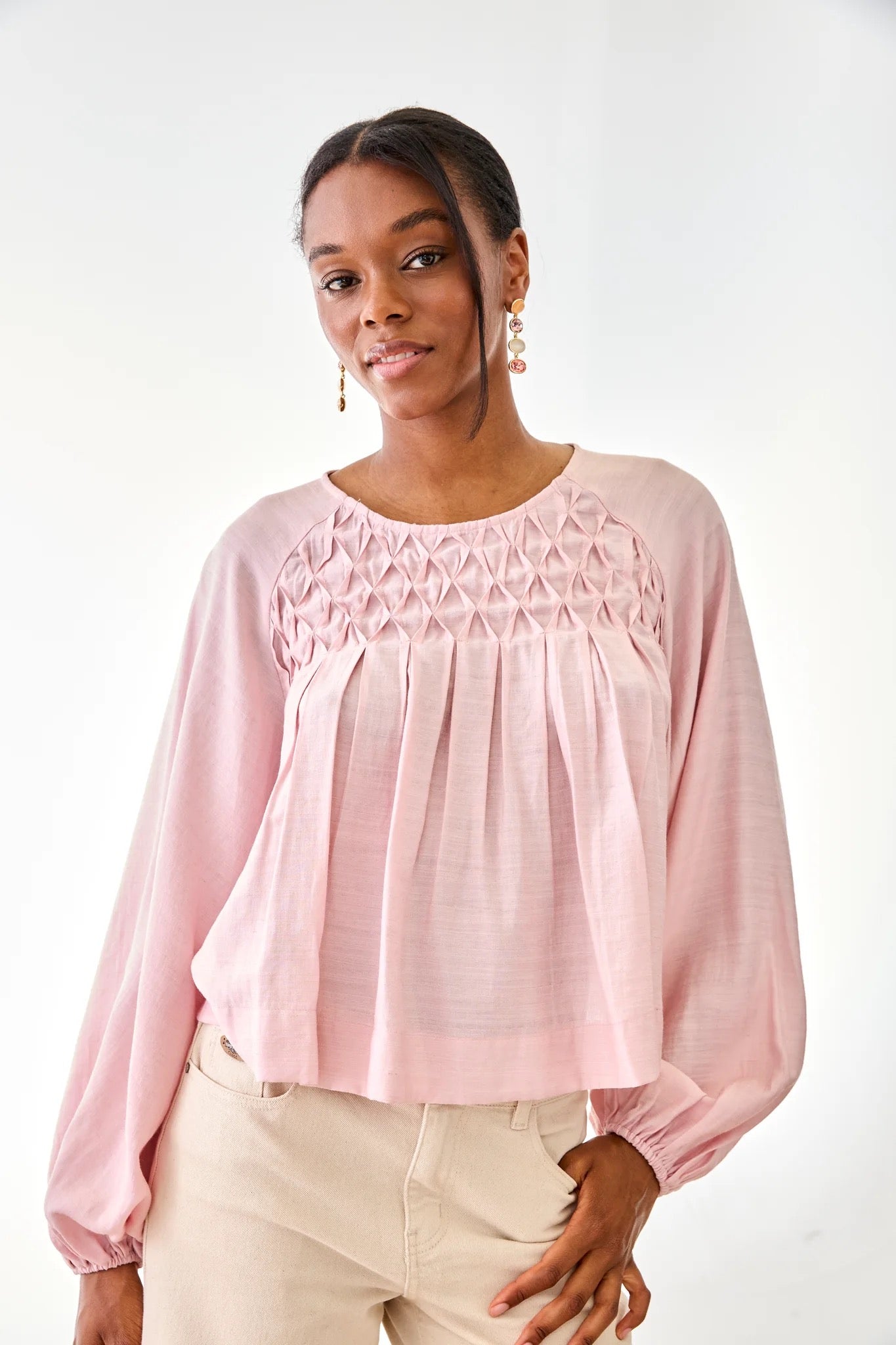 BLUSA PLISADOS GEOMÉTRICOS ROSA