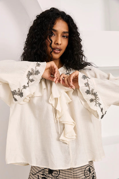 BLUSA VOLANTES PUÑOS JOYA IVORY