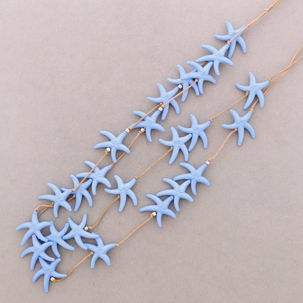 COLLAR ESTRELLAS AZUL CIELO